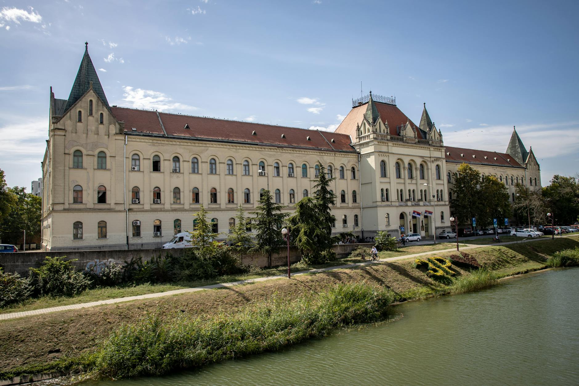 Beautiful view of the Zrenjanin Courthouse, a historic landmark by the river.